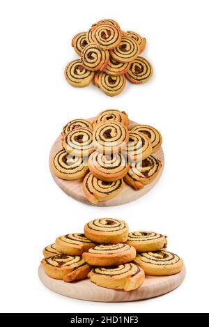 Baked cookies with raisins and poppy seeds isolated on white background. Stock Photo