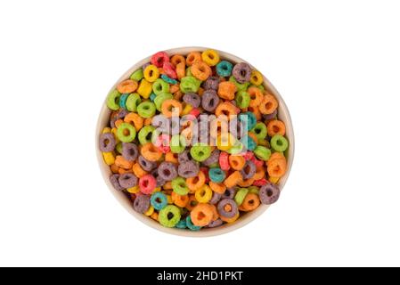 Colorful rings cereal spill out into a bowl. Breakfast. Isolated on a white background. Stock Photo