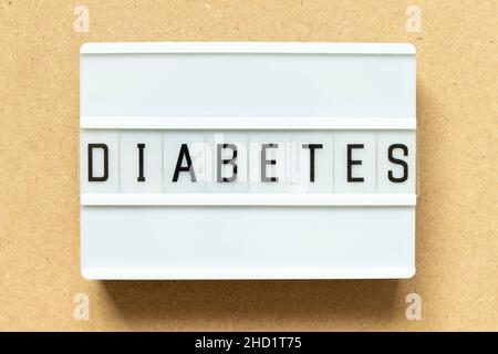 Lightbox with word diabetes on wood background Stock Photo