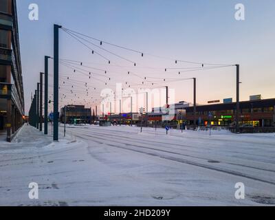 Turku, Finland - December 24, 2021: Horizontal Closeup Snowy View of Raisiontie Street in Turku, Finland. Stock Photo