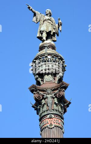 Spain, Barcelona, in the center of the square Portal de la Pau stand a column 60 meters hight with in this top the statue of Christopher Colombus. Stock Photo