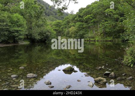 The river Derwent at Grange village, Borrowdale valley, Lake District National Park, Cumbria, England, UK Stock Photo