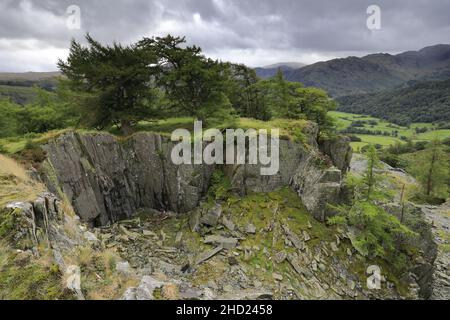 The quarry on Castle Crag fell above the Borrowdale pass valley, Lake District National Park, Cumbria, England, UK Castle Crag fell is one of the 214 Stock Photo