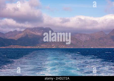 View from the stern of the Moskenes-Bodo ferry to Moskenes. Lofoten, Norway Stock Photo