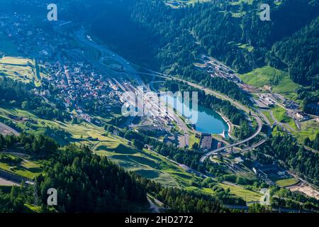 Aerial view of the town Airolo and parts of the pass street, seen from below Gotthard Pass. Stock Photo