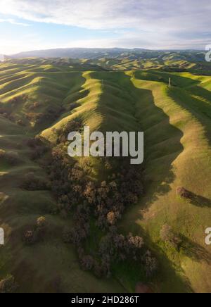 Morning sunlight shines on green hills in the scenic Tri-Valley region of Northern California, just east of San Francisco Bay. Stock Photo