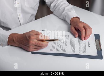 Contract signing concept. Verifying and certifying documents. Stock Photo