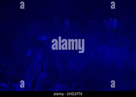 Dark blue painted canvas abstract background Stock Photo