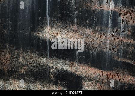 Worn out black painted corroded metal grunge texture Stock Photo