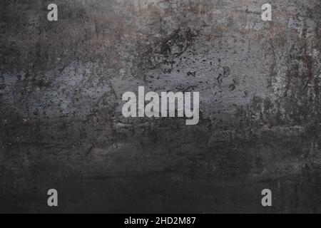 Dark gray weathered porcelain wall tile detail with worn out effect, grunge background or texture Stock Photo