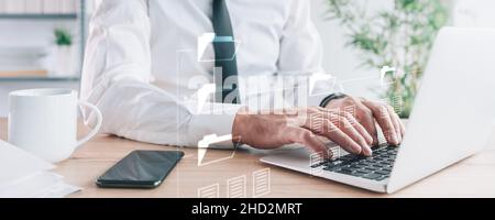 Document Management System (DMS) setup by businessman working on laptop computer in office, selective focus Stock Photo