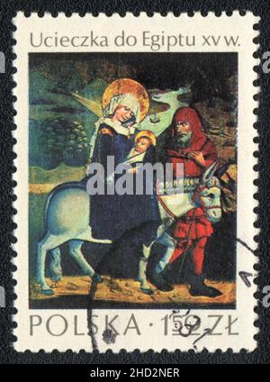 A stamp printed in Poland shows picture of the 'Flight into Egypt' XV century, The National Museum in Krakow, Poland, 1974 Stock Photo