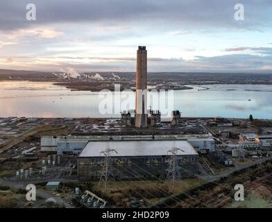 The last remaining section of the defunct Longannet power station in Fife was demolished today in a controlled explosion. the 600 foot tall chimney, which was Scotland’s tallest freestanding structure, was brought down by demolition experts as hundreds of locals watched.  (c) Dave Johnston Stock Photo