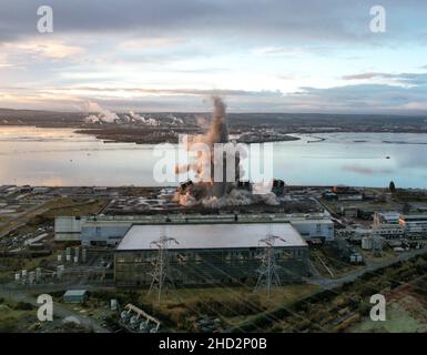 The last remaining section of the defunct Longannet power station in Fife was demolished today in a controlled explosion. the 600 foot tall chimney, which was Scotland’s tallest freestanding structure, was brought down by demolition experts as hundreds of locals watched.  (c) Dave Johnston Stock Photo