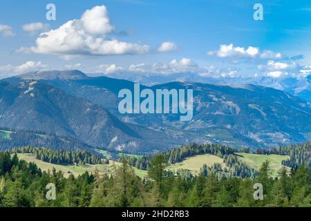 Overlooking the Puez-Geisler nature park mountains in the Dolomites seen from the Armentara meadows Stock Photo