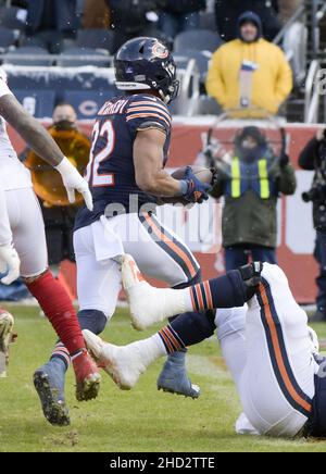 Chicago, United States. 02nd Jan, 2022. New York Giants Devontae Booker(28)  holds off Chicago Bears Deon Bush (26) to gains some yards at Soldier Field  in Chicago on Sunday, January 2, 2022.