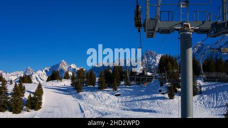 Panoramic view of chair lift in french alps, Europe Stock Photo