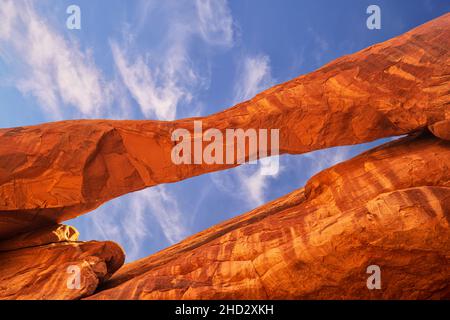 Unnamed arch and summer sky near Tower Arch in Arches National Park Stock Photo
