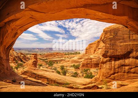 Tower Arch glows in morning light in Arches National Park in Utah Stock Photo