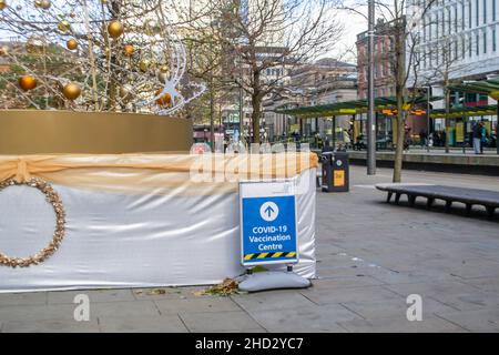 MANCHESTER, ENGLAND- 27 November 2021: Covid-19 Vaccination Centre sign in Manchester, England Stock Photo