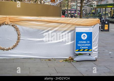 MANCHESTER, ENGLAND- 27 November 2021: Covid-19 Vaccination Centre sign in Manchester, England Stock Photo