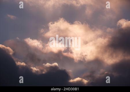 Close up frame of dramatic sunset clouds. Stock Photo