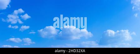 Panorama blue sky clouds background. Beautiful landscape with clouds in the sky. Stock Photo