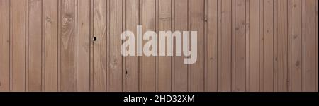 Panorama background with wooden brown boards, rails with texture. Stock Photo