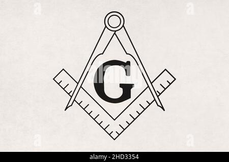 Close-up on a Masonic Square and Compasses printed on paper. Stock Photo