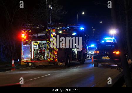 accident scene on the Spalding road at night with flashing lights from emergency vehicles Stock Photo