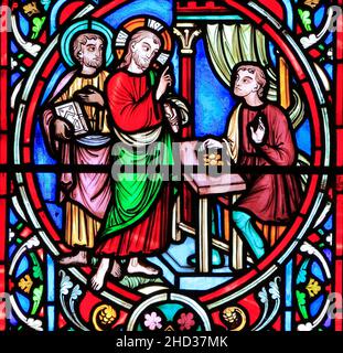 Scene from Life of Jesus, by Adolph Didron, Paris, 1860, stained glass window, Feltwell, Norfolk, England, Jesus calling Matthew, Tax Collector, to be Stock Photo