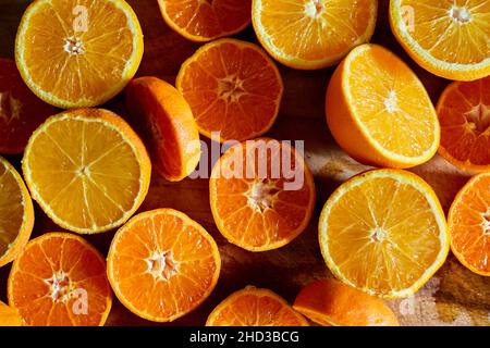 Orange Halves on Chopping Board Stock Photo