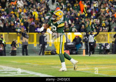 January 02, 2022: Green Bay Packers running back A.J. Dillon #28 celebrates  scoring a touchdown during NFL football game between the Minnesota Vikings  and the Green Bay Packers at Lambeau Field in