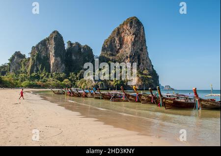 Early morning at Railay Beach West, one of the most famous beaches in Thailand. It is located on a peninsula Rai Leh and only accessible by boat. Stock Photo