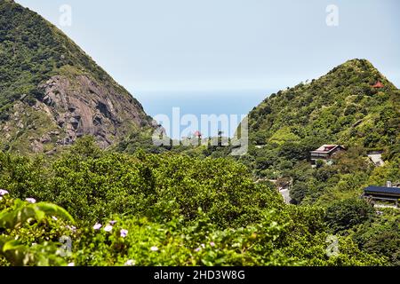 Panoramic view of the sea and hilly areas in the Jinguashi region of Taiwan. Stock Photo