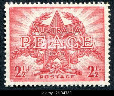 A 1946 issue 2 1/2d Australian postage stamp entitled ‘Peace 1945’ commemorating the end of the Second World War. The stamp was designed and engraved by Frank D. Manley. Stock Photo