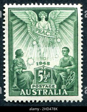 A 1946 issue 5 1/2d Australian postage stamp entitled ‘Peace 1945’ commemorating the end of the Second World War. The stamp was designed by George Lissenden and engraved by Frank D. Manley. Stock Photo