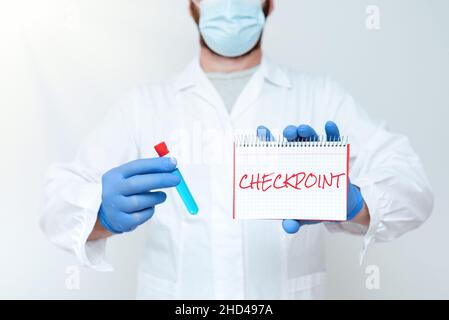 Writing displaying text Checkpoint. Word Written on manned entrance, where travelers are subject to security checks Chemist Displaying Medicine Stock Photo