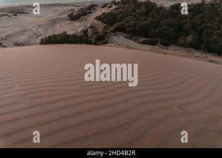 Sand dunes closeup. Patara sand dunes. Blowing wind makes rippled Patterns Stock Photo