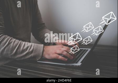 Business man hand using Laptop pc with email icon, Email concept Stock Photo
