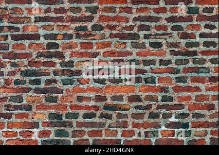 Grunge old weathered brick wall. Suitable for background. Stock Photo
