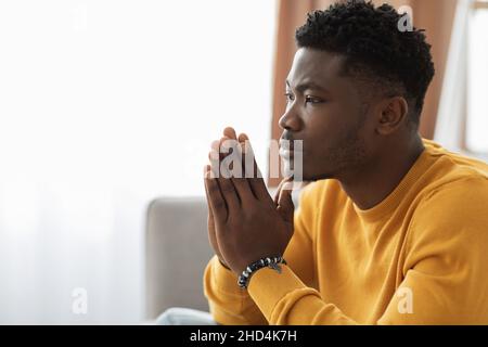 Thoughtful african american guy having headache, closeup portrait Stock Photo