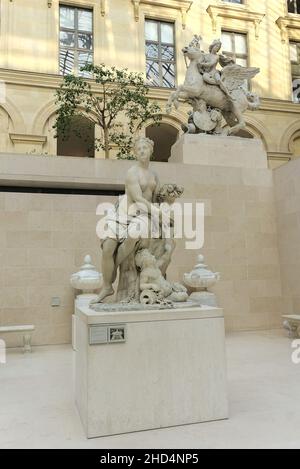 Sculptures by Antoine Coysevox in the Cour Marly courtyard in Richelieu Wing of Louvre Museum Stock Photo