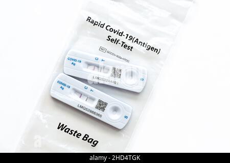 Covid-19 positive lateral flow test tests stored in plastic waste bag - Scotland, UK Stock Photo