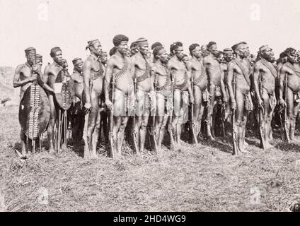 Vintage late 19th century/1900 photograph: Group of Zulu tribesmen, with rifles  South Africa, c.1900, Anglo Boer War. Stock Photo