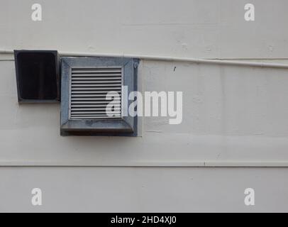 Detail of a vent on the side of a building. Stock Photo