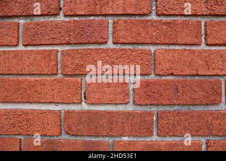 Closeup of red brick wall with gray mortar, great for background Stock Photo