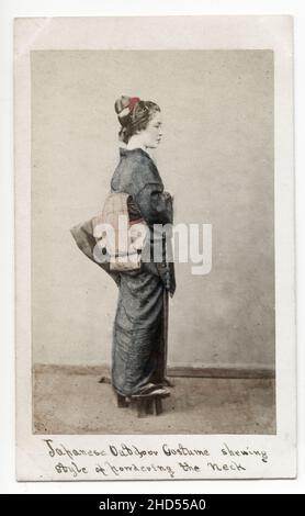 19th century vintage photograph - 1860's Japan carte de visite attributed to Felix Beato studio: woman in outdoor costume. Stock Photo