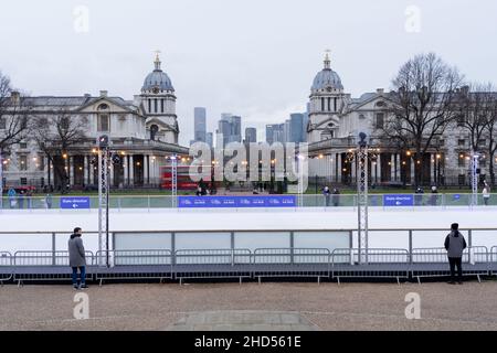 London UK 3rd January 2022. People are enjoying the bank holiday Monday Ice Skating in The Queen's House Ice Rink with mobile cafe facilities. Credit: Xiu Bao/Alamy Live News Stock Photo