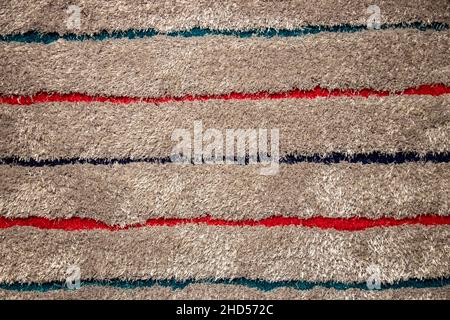 Coir fibre background texture. Close-up of details of a natural brown coconut doormat for the house entrance. Top view. Abstract backdrop with space. Stock Photo